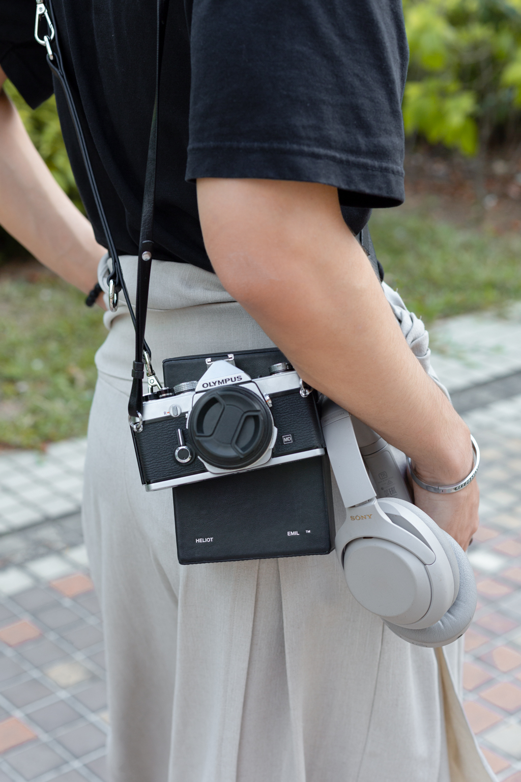 Kienan-Content_Creator-Pants_Plop_Apparels__The_Idiot-Shoes_Dr._Martens-Bag_Heliot_Emil-Accessories_Far_East_Plaza-Headphones_Sony-UNIFORM-25082023-3