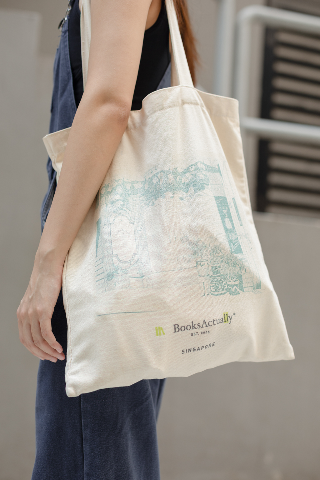 Denise-Singaporean-Occupational_Therapist-Earrings_By_Invite_Only-Top_JOAH_BROWN-Overalls_Arcade-Shoes_Converse-Tote_BooksActually-UNIFORM-27092023-3