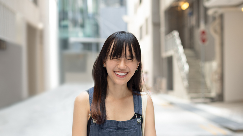 Denise-Singaporean-Occupational_Therapist-Earrings_By_Invite_Only-Top_JOAH_BROWN-Overalls_Arcade-Shoes_Converse-Tote_BooksActually-UNIFORM-27092023-5