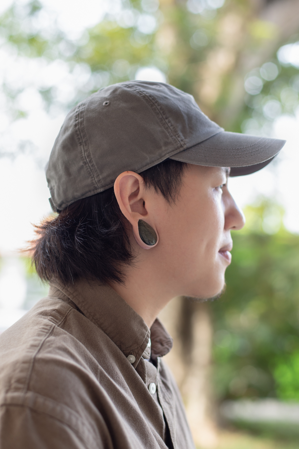 Jon-Singaporean-Brand_Strategist-Shirt_HM-Jeans_Zara-Sandals_Birkenstock-Cap_Montbell-Earrings_PlugYourHoles-UNIFORM-19122023-2