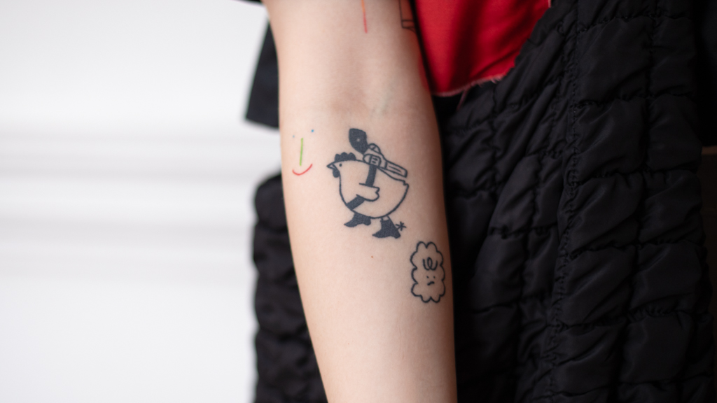 Natasha-Singaporean-Illustrator-Top_Liunic_On_Things-Skirt_Secondhand-Shoes_Dr_Martens-Earrings_Japan-Necklace_ThreeOneTwoFive-Socks_Sadshrimps-Bag_COS-UNIFORM-16042024-3