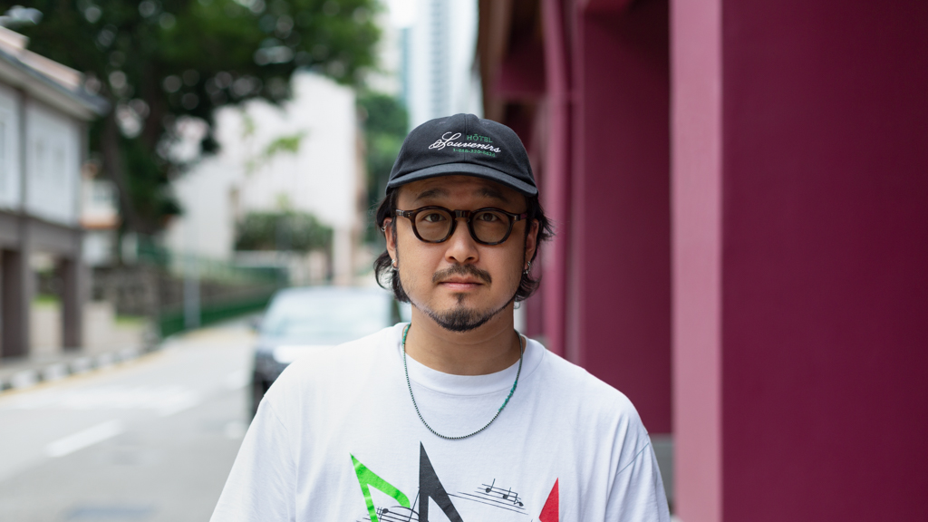 Aki-Japanese-Hairdresser-Cap_A.P.C-Shirt_Thrifted-Jeans_Thrifted-Shoes_Alden-Watch_Patek_Philippe-Tattoos_Japan-Glasses_Guepard-UNIFORM-12092024-2