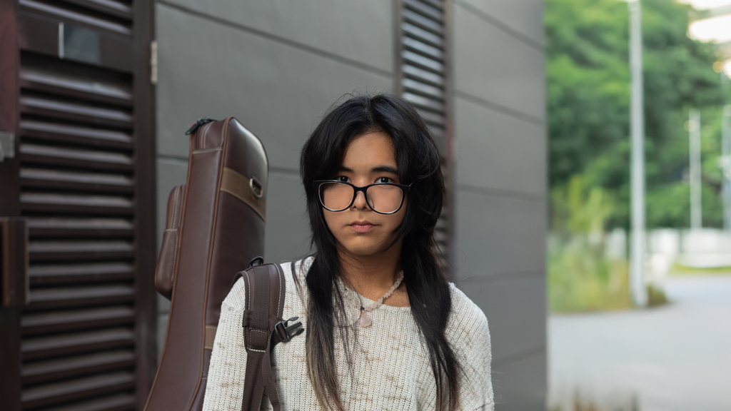 Gabe-Singaporean-Musician-Top_Thrifted-Jeans_Dolce_and_Gabbana-Shoes-Doc_Martens-Bracelet_Phillipines_Malaysia-Rings_Kuala_Lumpur_Ebay-Necklace_Thrifted-Glasses_Textile_Centre-UNIF-4