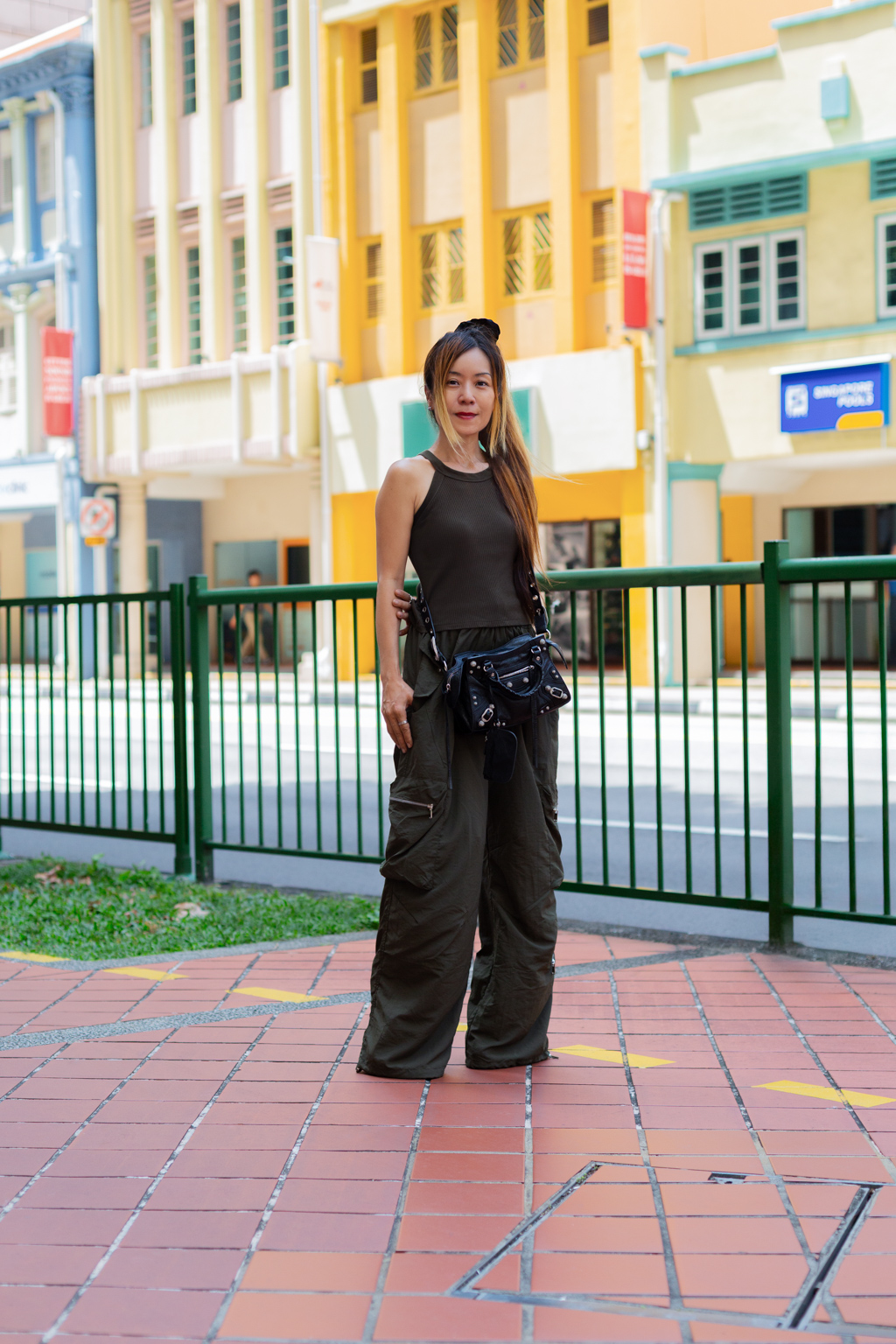 Poon-Singaporean-Administrator-Top_UNIQLO-Pants_Lilys_Fashion-Bag_Balenciaga-Shoes_DSQUARED2-Rings_Chanel__Cartier-UNIFORM-08072025-1
